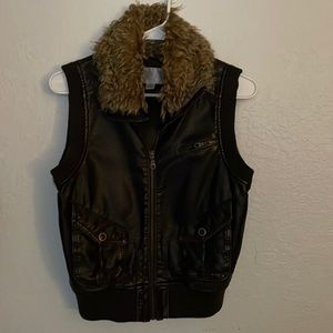 Faux leather fur vest jacket.